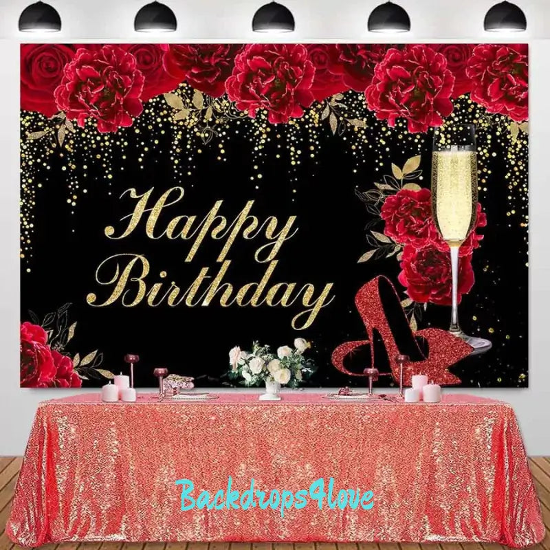 Chic birthday decoration backdrop with red high heels, roses, and golden accents.
