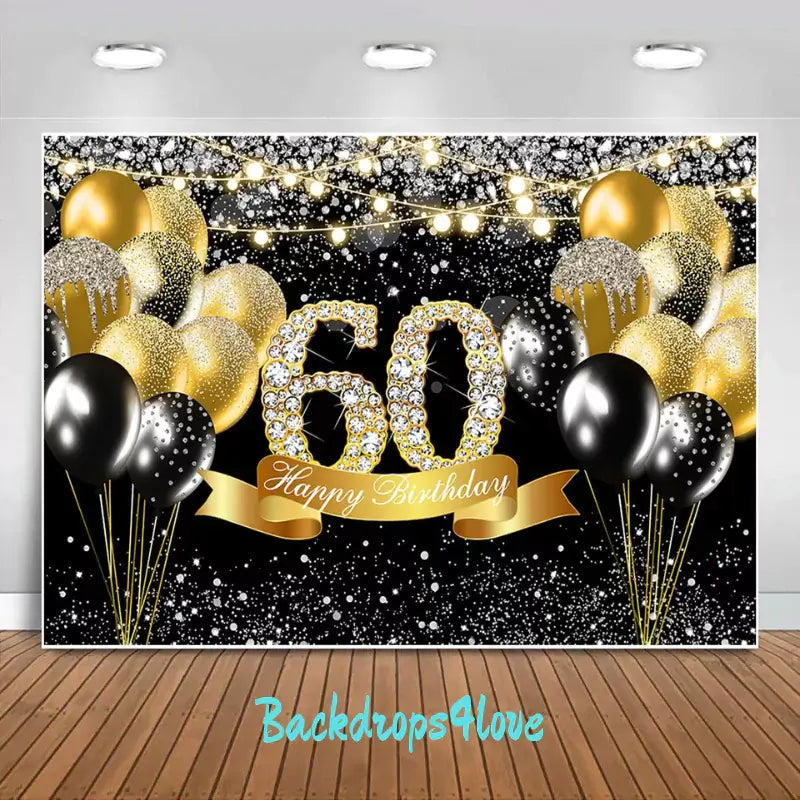 Elegant 60th birthday backdrop featuring gold and black balloons, glittering diamond '60', and Happy Birthday ribbon.