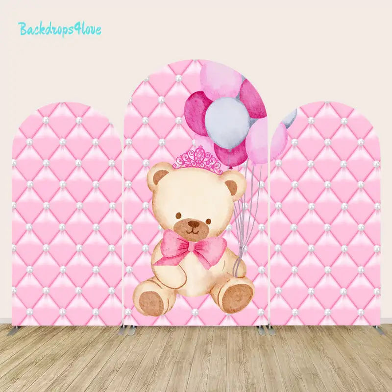 Three-piece arch backdrop set with princess teddy bear, balloons, and pink quilted designs