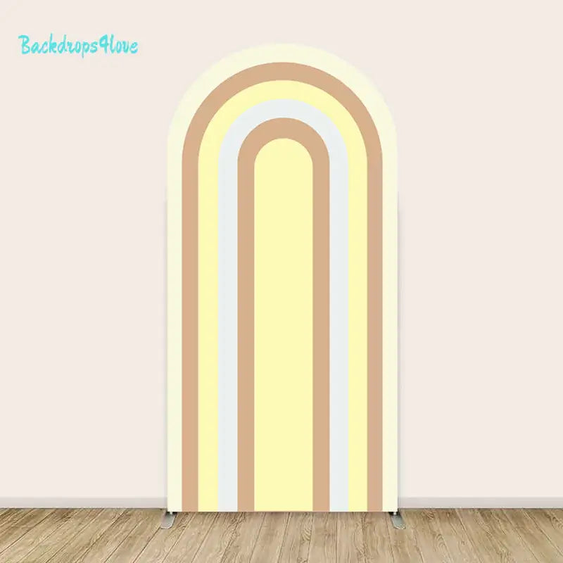 Rainbow-colored striped arch backdrop for baby showers and children's parties