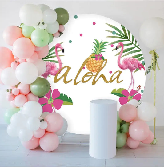 Aloha-themed round backdrop with flamingos, pineapple, and tropical flowers, perfect for luau parties