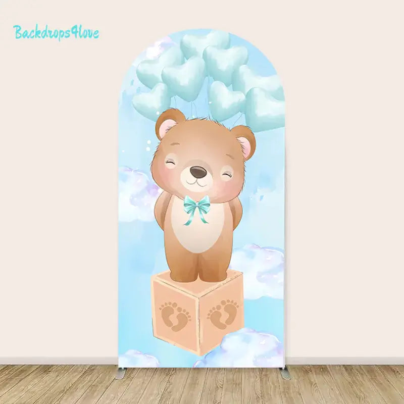 Teddy bear with blue heart balloons on the left arch panel