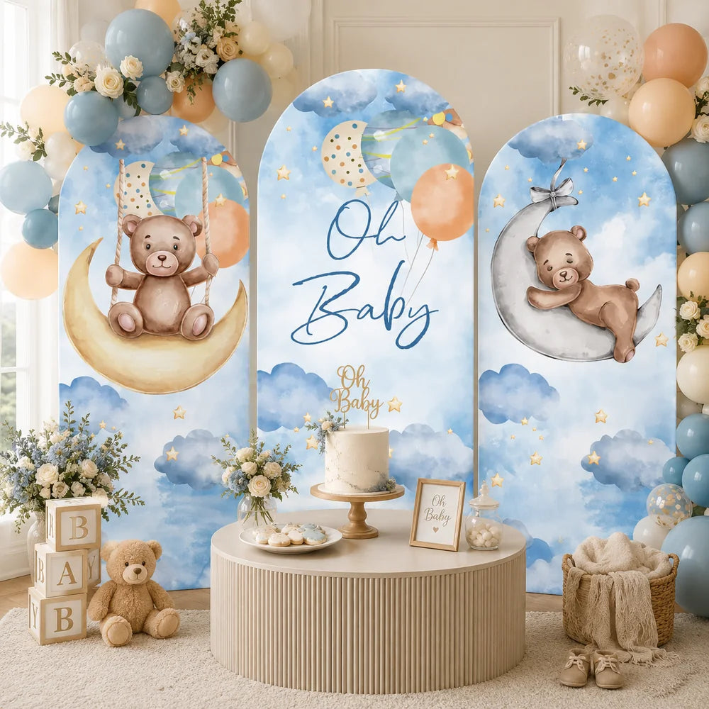 Blue baby shower set with three arch backdrop covers featuring teddy bears on crescent moons, Oh Baby lettering, watercolor clouds, stars and pastel balloons.