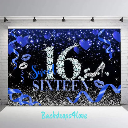 Elegant blue and black Sweet 16 party backdrop featuring sparkling designs and ribbons.