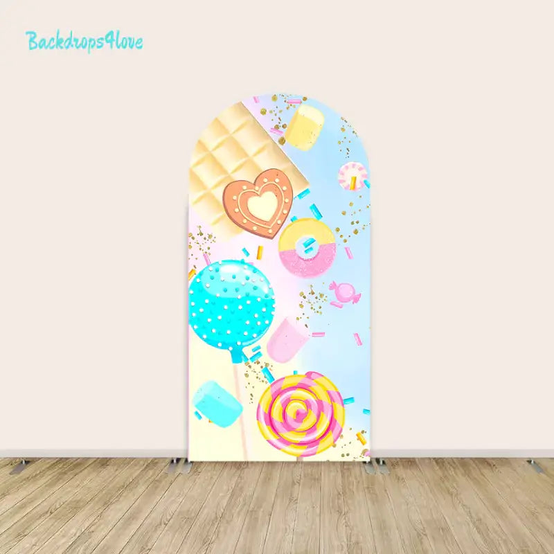 Left arch featuring colorful candy lollipops, chocolate bars, and sprinkled treats in pastel shades.