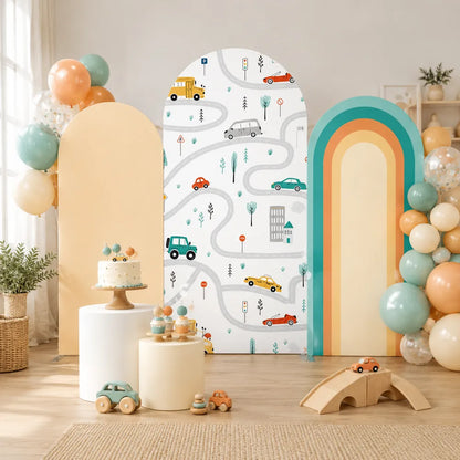 Three-piece kids party arch backdrop covers set with a road map design, colorful cars, traffic signs and a retro teal and orange rainbow arch.
