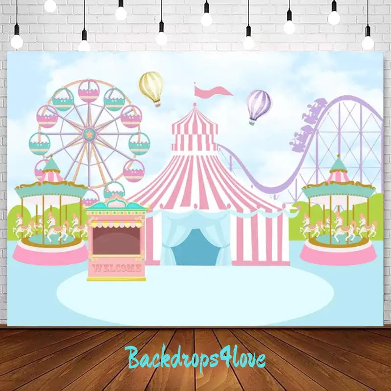 A colorful carnival-themed backdrop featuring a Ferris wheel, carousel, and big top circus tent, perfect for kids' birthday parties and fun fair celebrations.