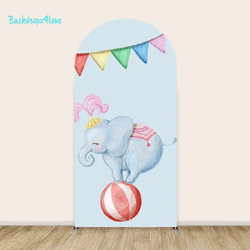 Right arch with an elephant balancing on a ball and colorful bunting