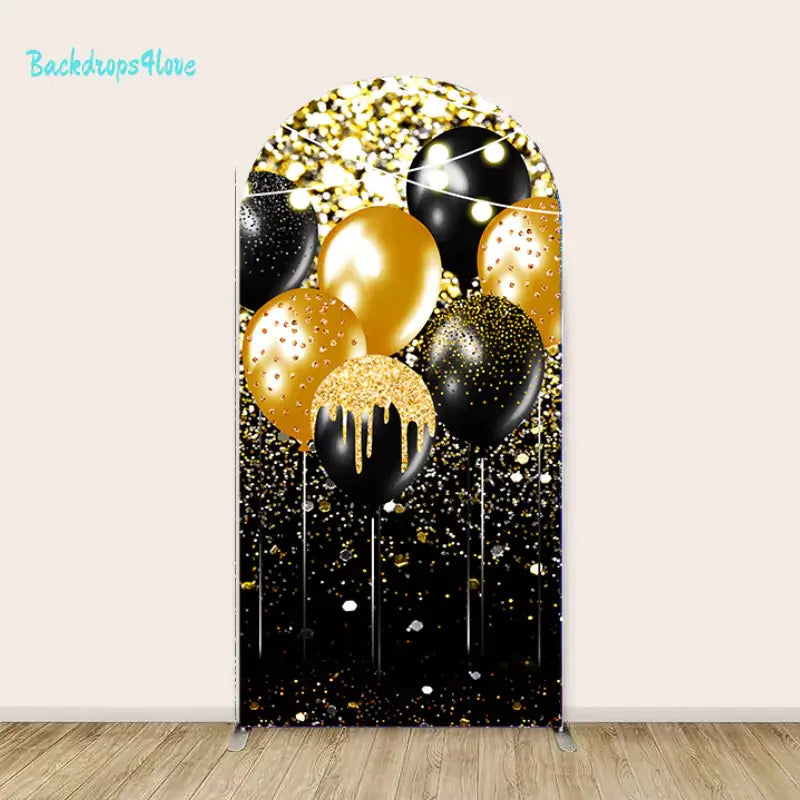 Right arch backdrop with black and gold balloons and confetti for Class of 2024 graduation