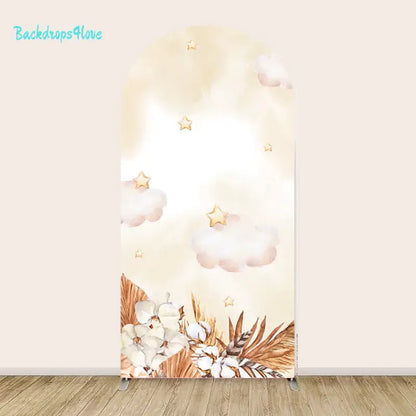 Left arch backdrop with watercolor clouds, stars, and floral accents for baby shower