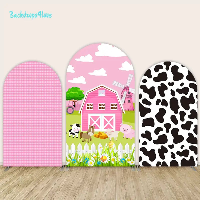 Set of three arch panels with pink farm animal designs, pink gingham, and cow print.