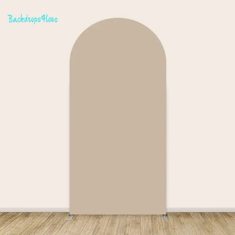 Left arch backdrop with solid neutral beige color for baby shower decoration