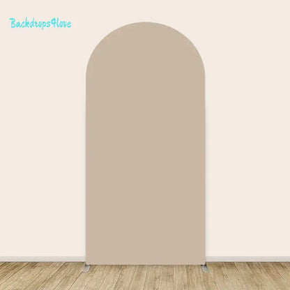 Left arch backdrop with solid neutral beige color for baby shower decoration