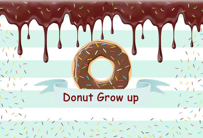 Fun chocolate-themed Donut Grow Up party backdrop with sprinkles, ideal for sweet birthday celebrations