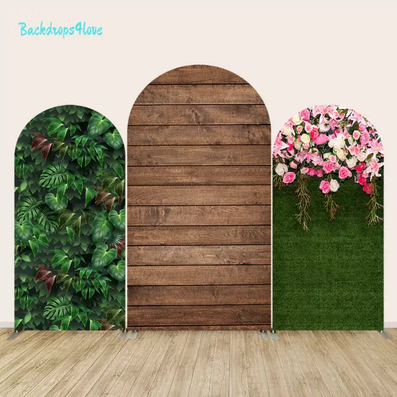 Elegant arch backdrop set with rustic wood, greenery, and floral designs