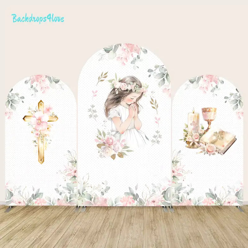 First Communion arch backdrop set with three panels featuring floral designs, a gold cross, a praying girl, and a chalice with a Bible, perfect for religious celebrations.