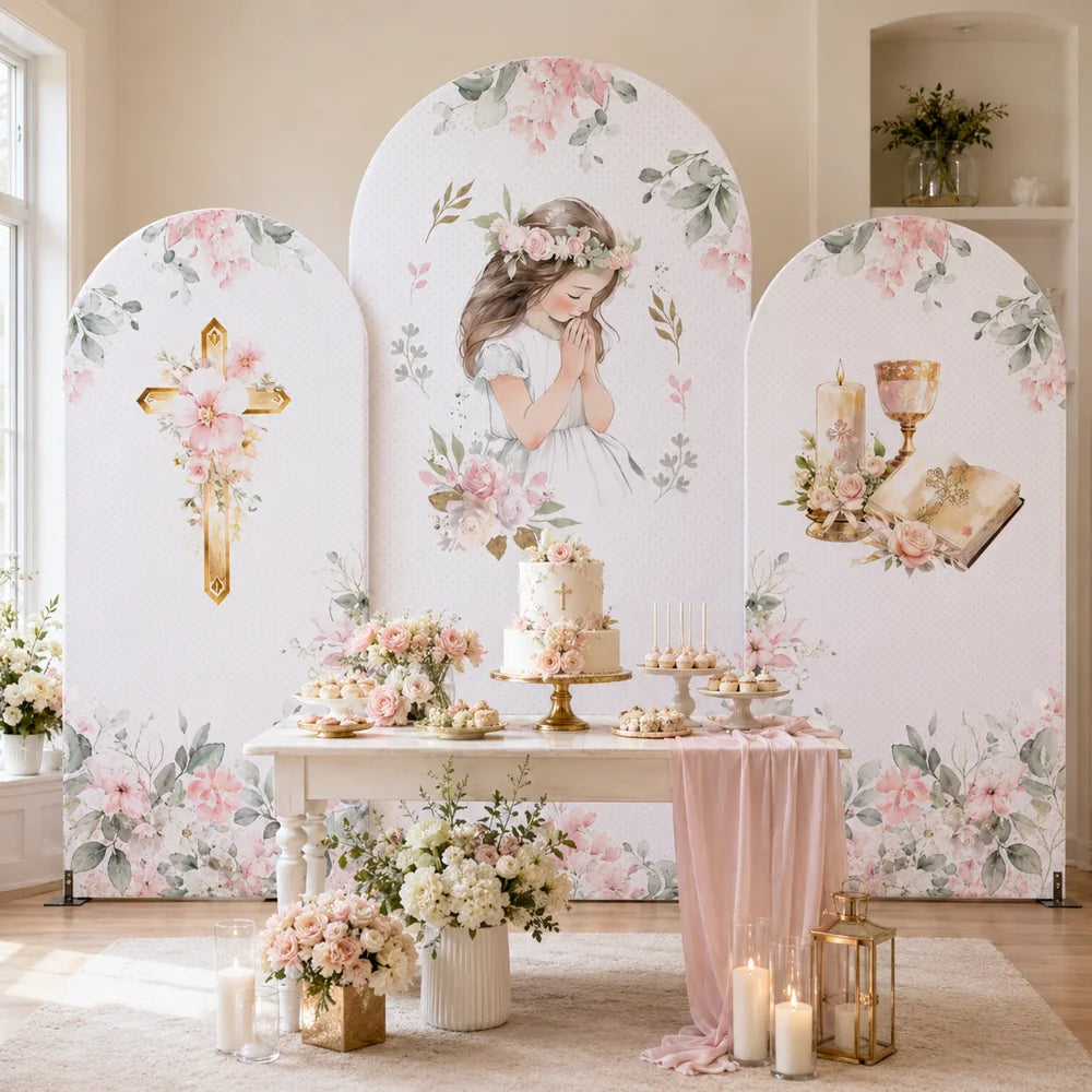 Three-piece First Communion arch backdrop covers set with a praying girl, gold cross, chalice, candle, Bible and soft pink floral designs.