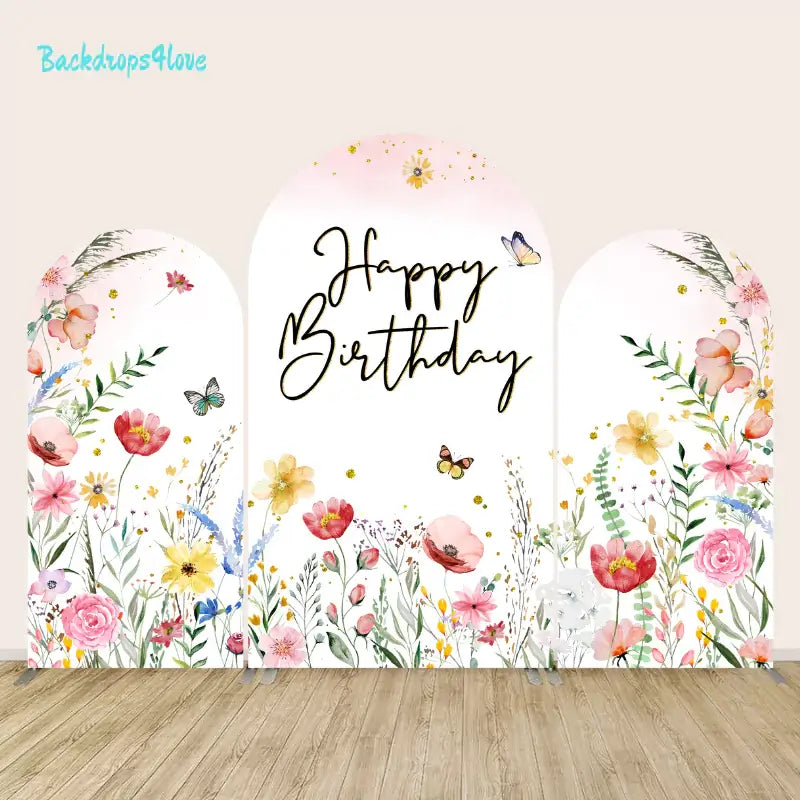 Floral Happy Birthday arch backdrop set with three panels featuring colorful wildflowers, butterflies, and elegant "Happy Birthday" text, perfect for birthday parties and celebrations.