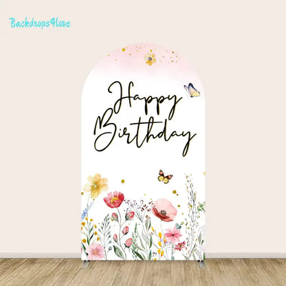 Center arch panel of the Happy Birthday backdrop set featuring elegant "Happy Birthday" text surrounded by colorful wildflowers and butterflies.