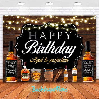 Happy birthday backdrop with whiskey bottles and a rustic wood background, perfect for party decorations.