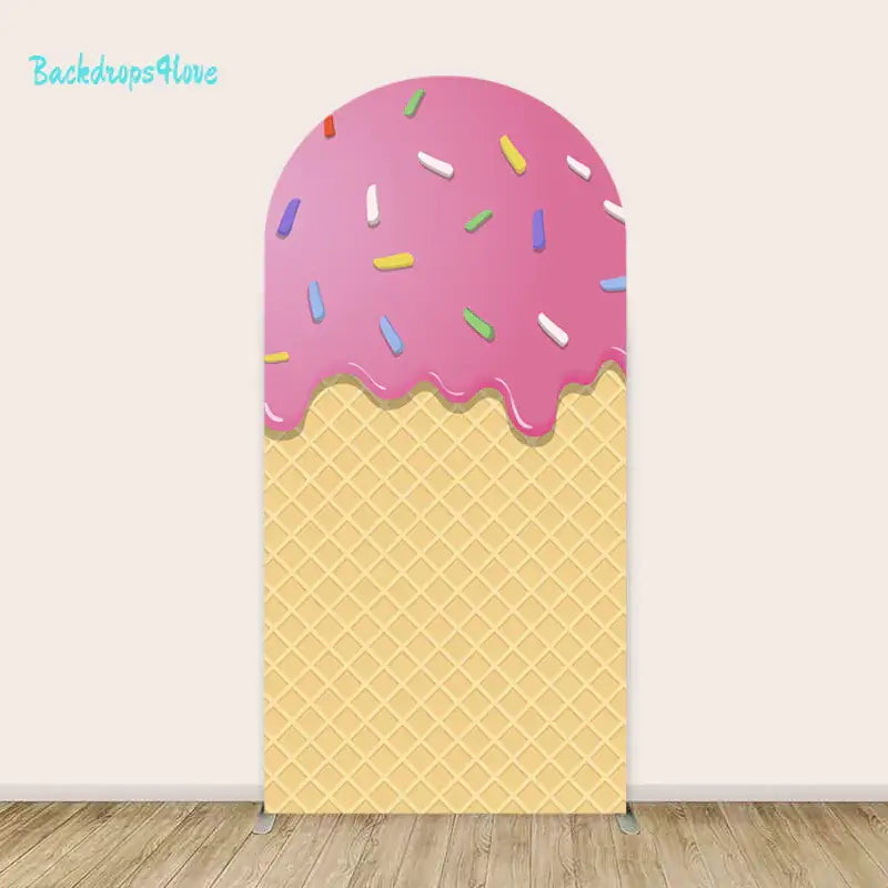 Decorative left arch featuring an ice cream cone pattern with pink frosting and sprinkles