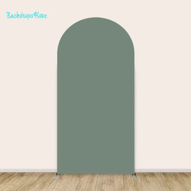 Right arch backdrop with a solid muted green color.