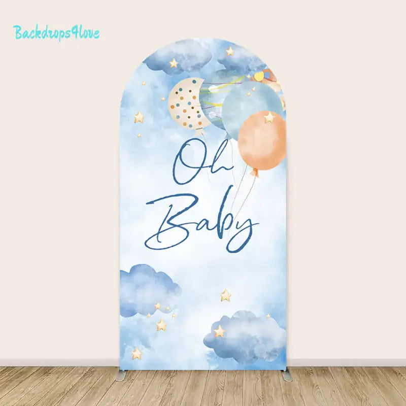 Center arch featuring ‘Oh Baby’ handwritten text with pastel balloons floating in a cloudy watercolor sky.