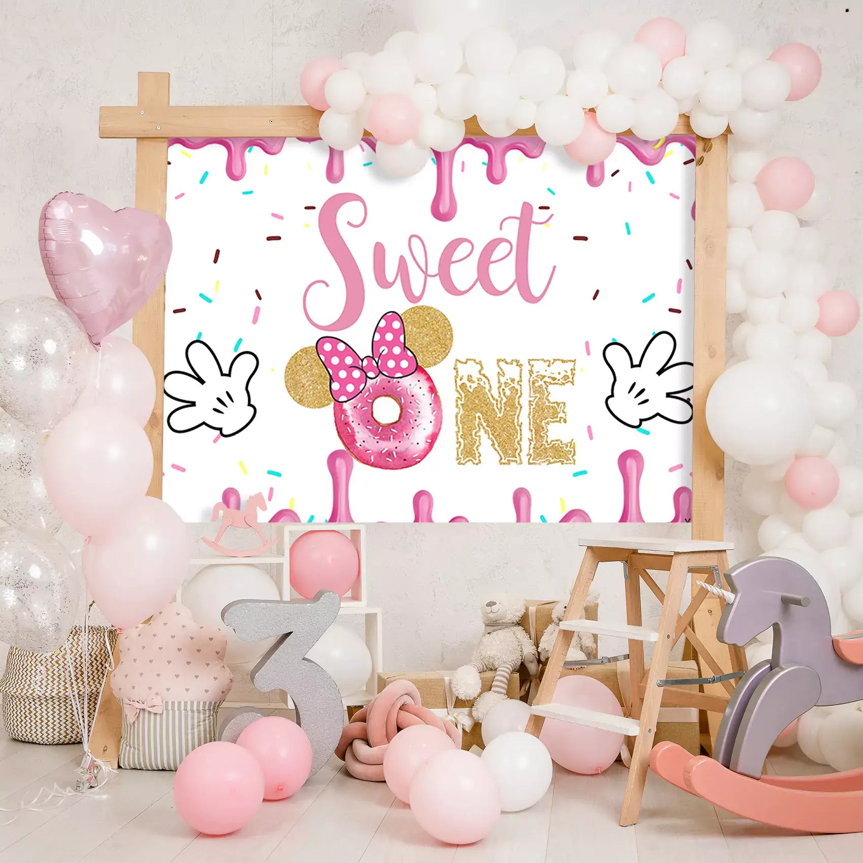 Sweet One Minnie Mouse-themed birthday backdrop with pink donuts and festive design, perfect for 1st birthday parties