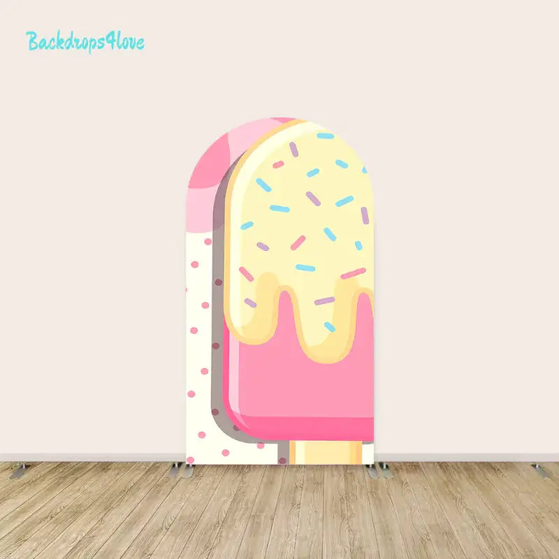 Center arch featuring a pink popsicle dripping with yellow sprinkles, surrounded by colorful candy and treats in a pastel palette.