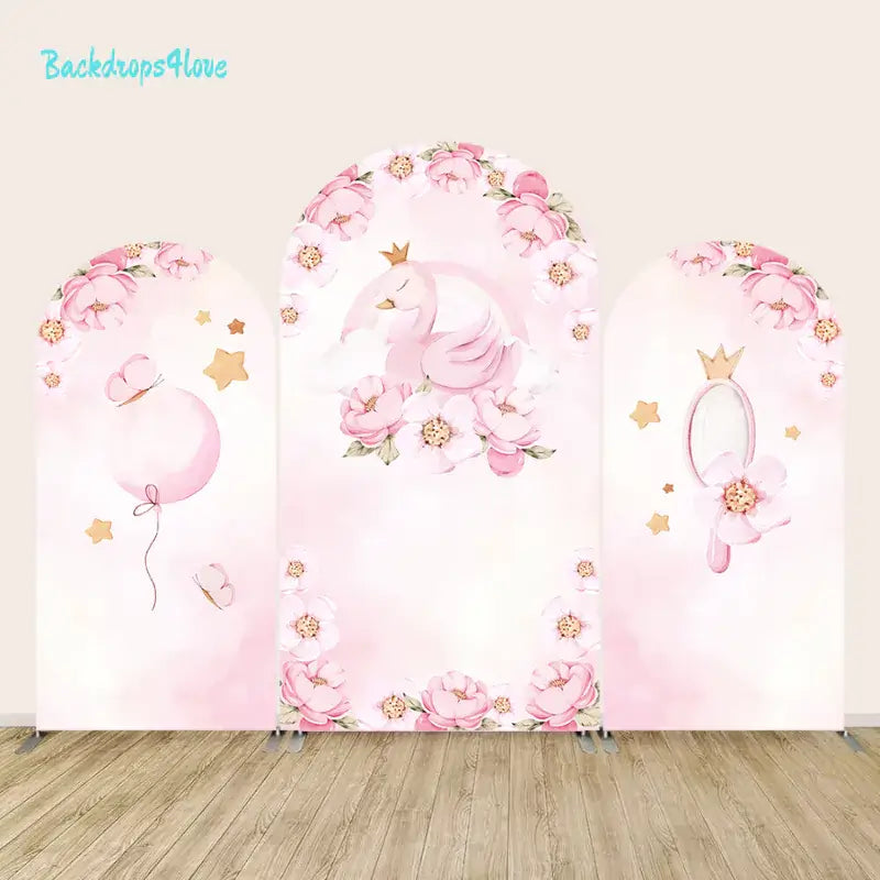 Three-piece arch backdrop set with pink swan, floral designs, and princess theme