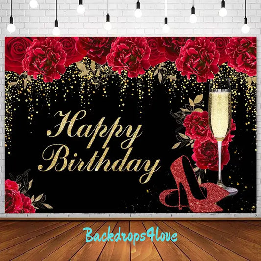 Elegant birthday backdrop with red roses, golden sparkles, and 'Happy Birthday' text on a black background.