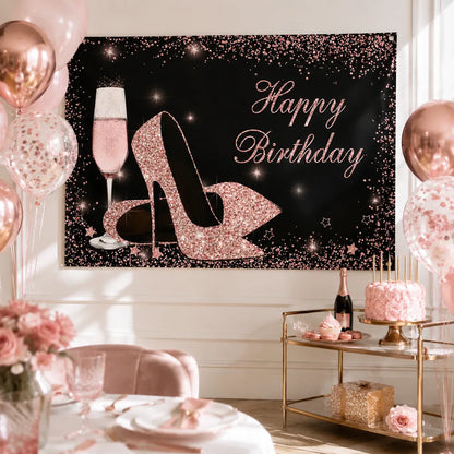 Black and rose gold Happy Birthday banner with glitter high heels, pink champagne glass and sparkling confetti for an elegant women's birthday party.