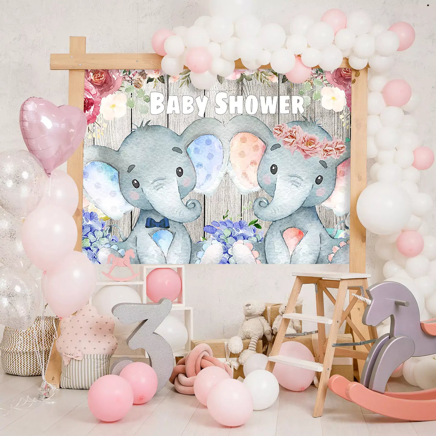 Adorable twin elephants baby shower backdrop with floral designs and rustic wooden background, perfect for celebrations