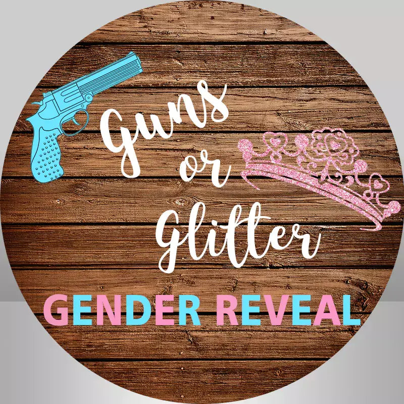 Round rustic gender reveal backdrop with wooden background, featuring 'Guns or Glitter' text, a blue gun icon for boys, and a pink glittery tiara for girls.