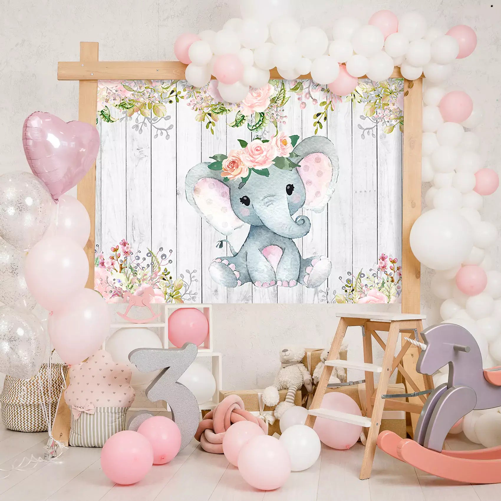 Adorable elephant baby shower backdrop with floral designs and rustic wooden background, perfect for celebrations