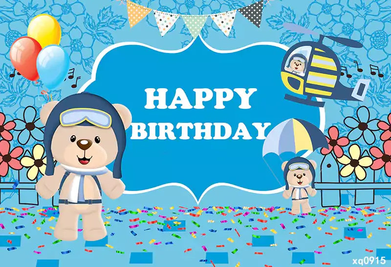 a blue happy birthday photography backdrop features teddy bears, balloons and helicopter