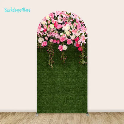 Arched backdrop with vibrant pink and white floral design on green background