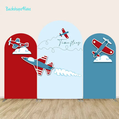 Airplane-themed arch backdrop set for children's parties, with playful airplane illustrations and 'Time Flies' text on the center arch