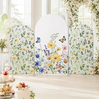 Three-piece wildflower butterfly arch backdrop covers set with watercolor daisies, blue and yellow flowers, botanical greenery and colorful butterflies.