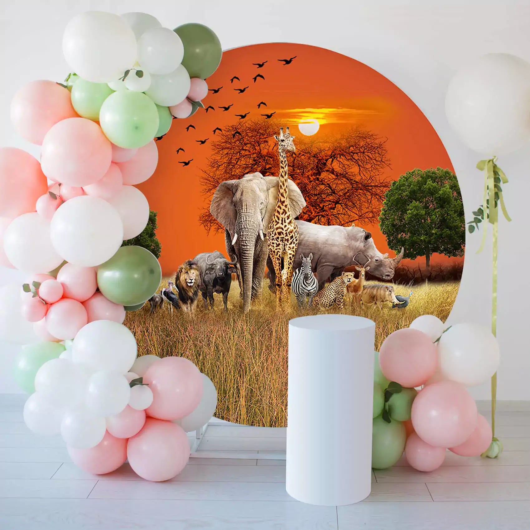 Safari wildlife round backdrop featuring elephants, giraffes, lions, and other animals against a sunset background